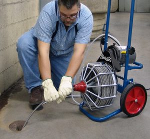 This drain cleaning machine features 2-way auto cable feed with hands off rotating cable for added safety.